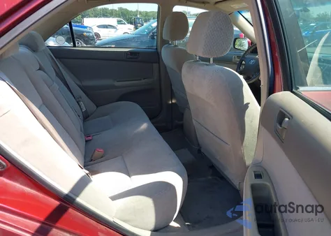 2003 Toyota Camry Le from USA, damaged, VIN 4T1BE32K13U128184